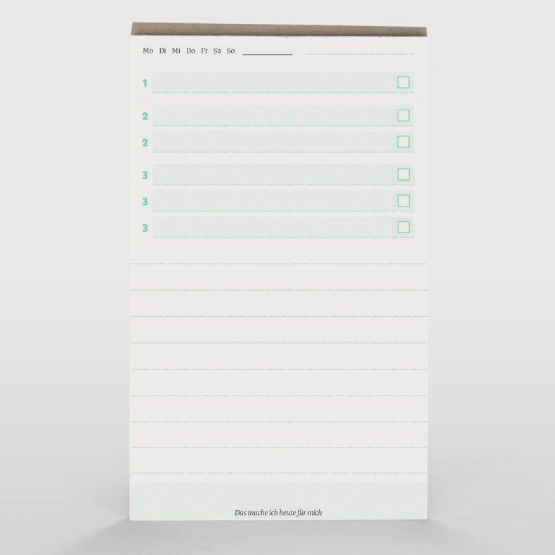 Open view of 'Ein Guter Block' notepad with blank to-do list and checkboxes, designed for daily planning and organization, displayed against a white background.