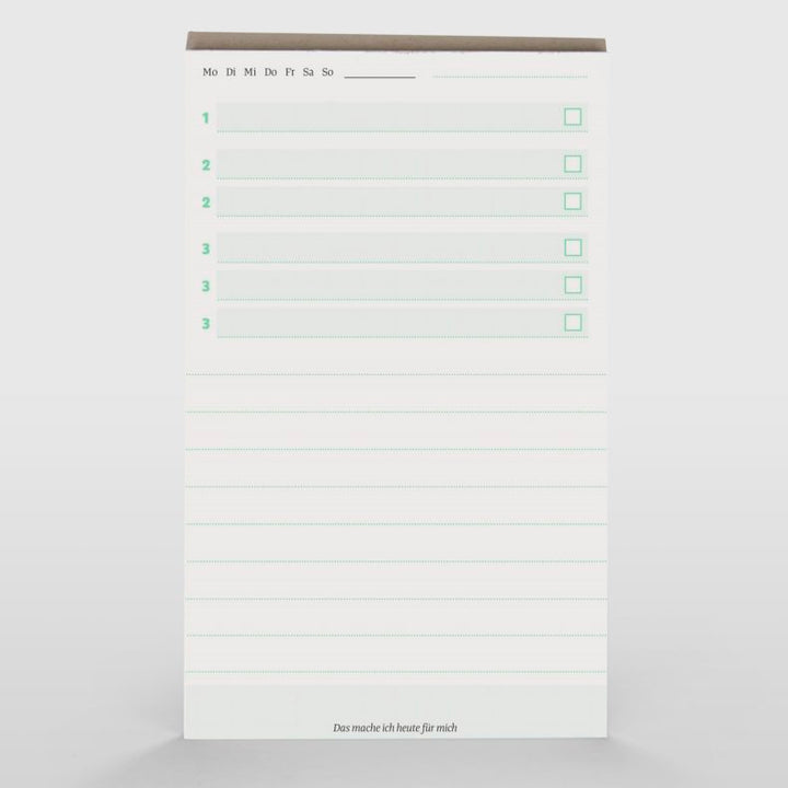 Open view of 'Ein Guter Block' notepad with blank to-do list and checkboxes, designed for daily planning and organization, displayed against a white background.